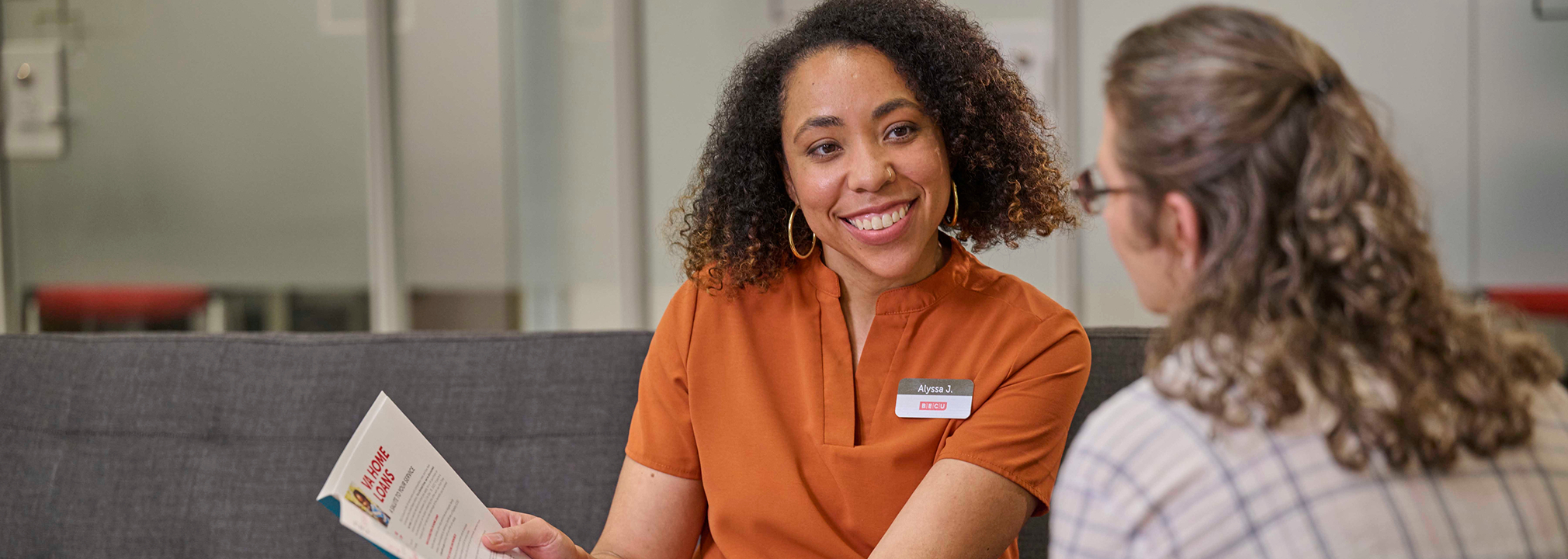 a woman in an orange shirt