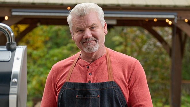 a man wearing an apron