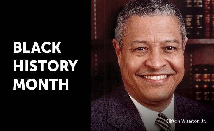 Portrait of Clifton Wharton Jr. with "Black History Month" in white letters on a black background to the left of the image