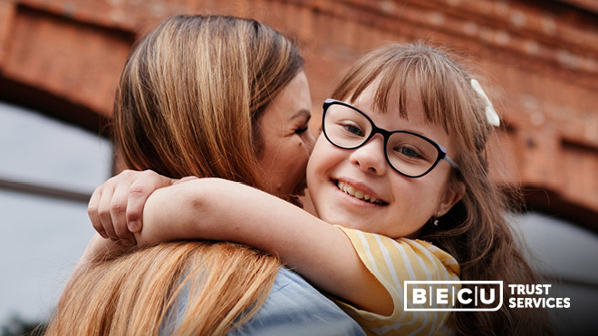 A daughter hugging her mother and smiling