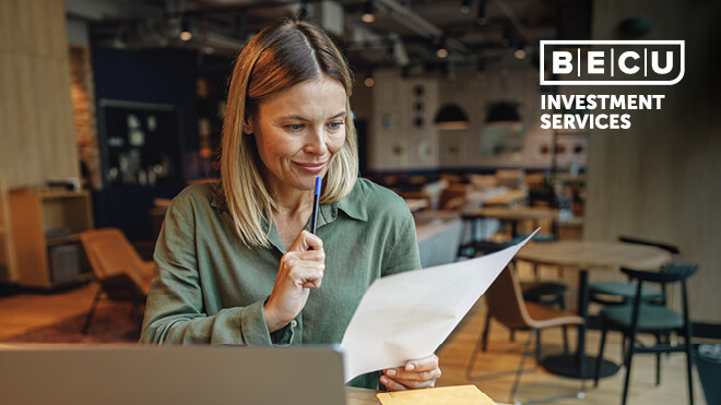 A woman reviewing a document. BECU Investment Services logo.