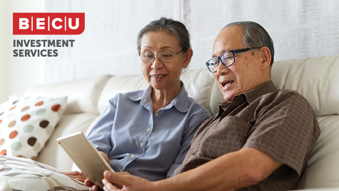An elderly man and woman looking at tablet screen. BECU Investment Services logo.