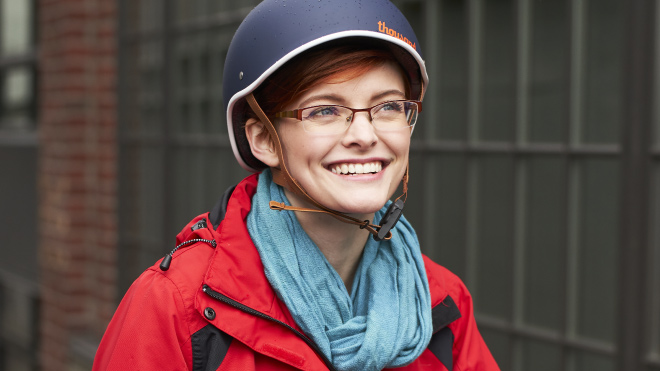 Woman wearing a bike helmet