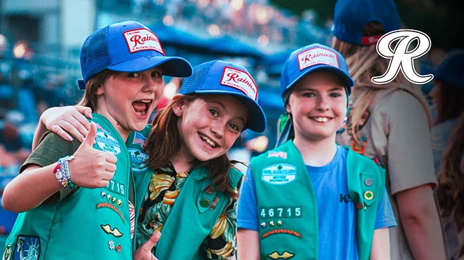 a group of girls wearing matching outfits