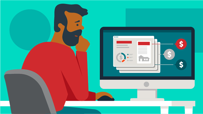 Man typing at computer looking at HELOC options