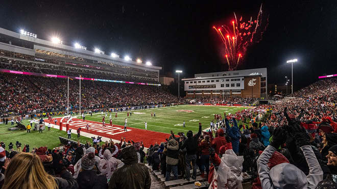 A picture of a home football game for the Washington State Cougars.