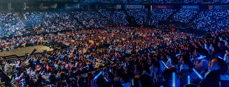 A crowd of people attending an Angel of the Winds concert