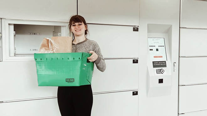 A woman with food at her GoodRoots locker.
