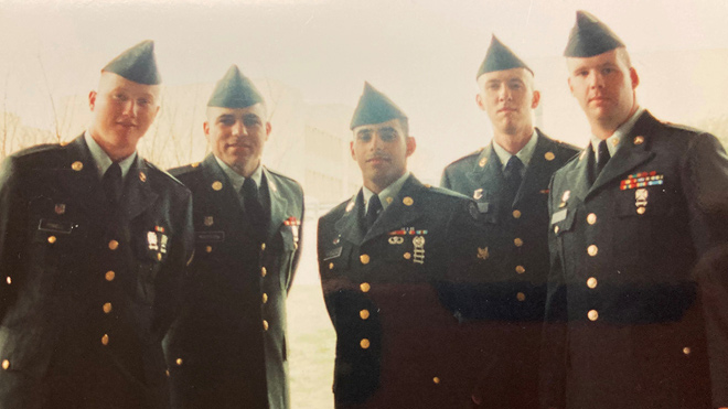 BECU employee Marc W. and other Marines pose for a group photo in their uniforms. 
