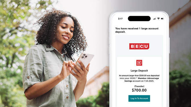 A phone screen displays a BECU large deposit alert. In the background, a woman looks at her phone, suggesting she's reading the notification.