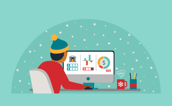 This is an illustration that portray a person look at a computer and identifying their finances. One the computer are charts, a bank icon, a money icon and a graph. The individual in the illustration is wearing a beanie and a red sweater. They are sitting at a desk, facing the computer. Next to them is a mug and pencil holder. They are also sitting in front of a window and there are snowflakes outside.