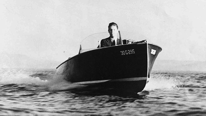 Man in a boat, first BECU boat loan