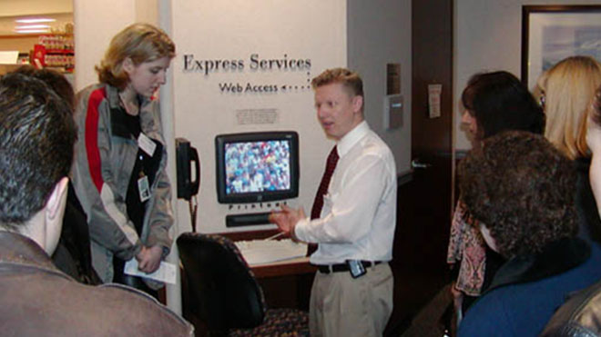 A man performing a demo of BECU's introduction to Online Banking