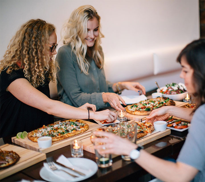 Chandler enjoying dinner with friends