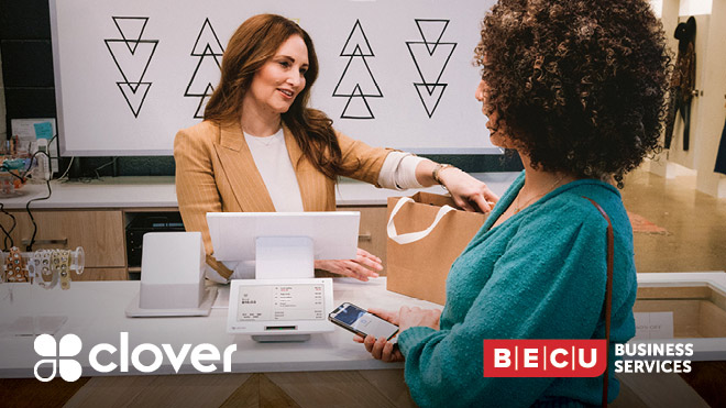 A woman working a cash register scanning and bagging items while another woman prepares to pay for her purchases using her phone. Clover logo and BECU Business Services logo.